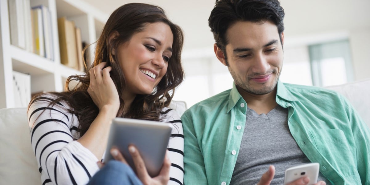 man and woman reviewing document together