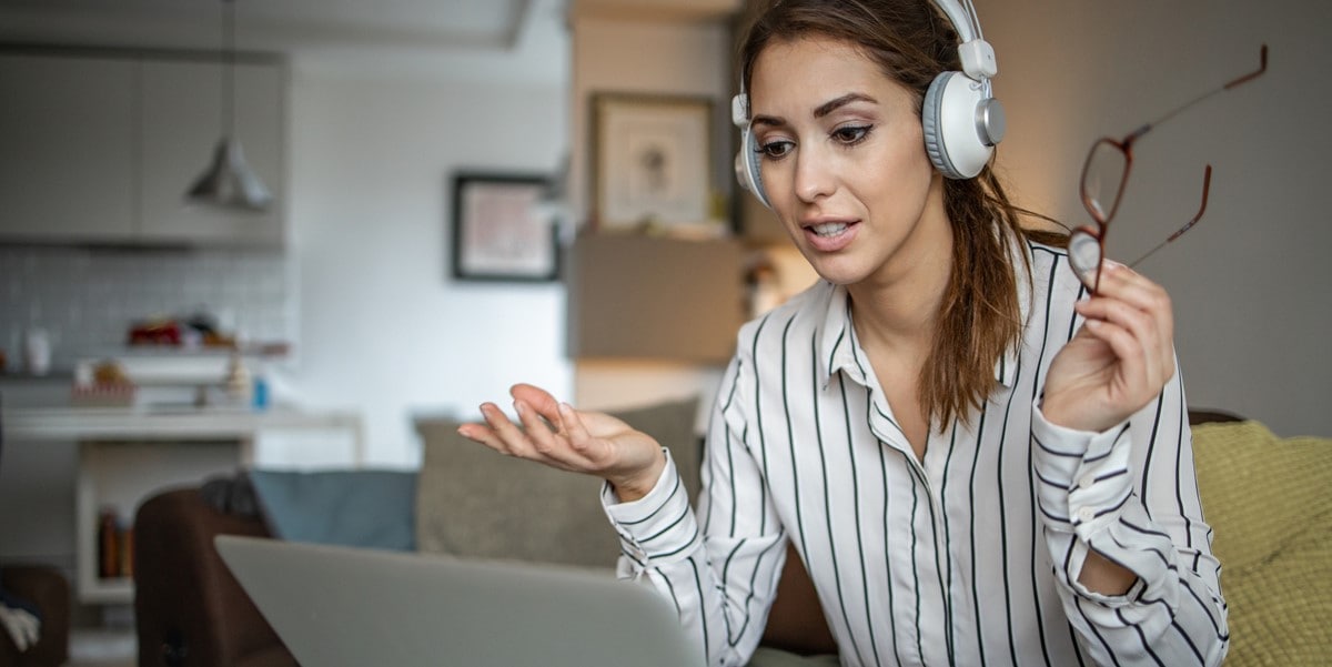 woman working remotely with headset